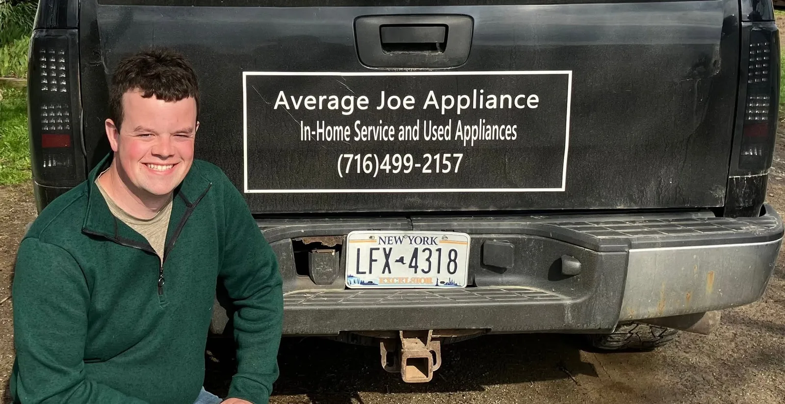 Joe from Average Joe Appliance beside his service truck